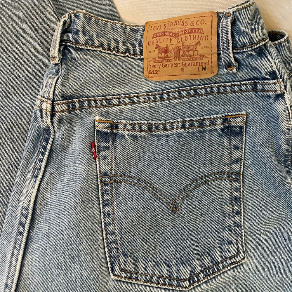 Vintage 90s women’s Levi’s jeans labeled a size 16